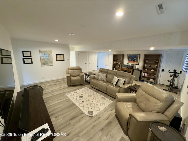 3048 Rangeview Dr, Jackson, WY 83001 - living room with visible vents, baseboards, light wood finished floors, and recessed lighting