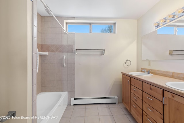 708 Palisades Ln, Alpine, WY 83128 - bathroom with washtub / shower combination, a sink, a baseboard radiator, double vanity, and tile patterned floors