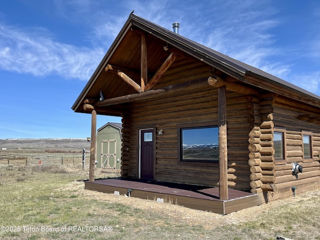 15 E Elk Horn Rd, Daniel, WY 83115 - view of home's exterior with log exterior and an outdoor structure