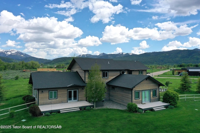 9075 Nesting Eagles Loop, Victor, ID 83455 - rear view of property with french doors and a deck with mountain view