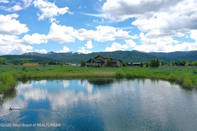 9075 Nesting Eagles Loop, Victor, ID 83455 - water view with a mountain backdrop