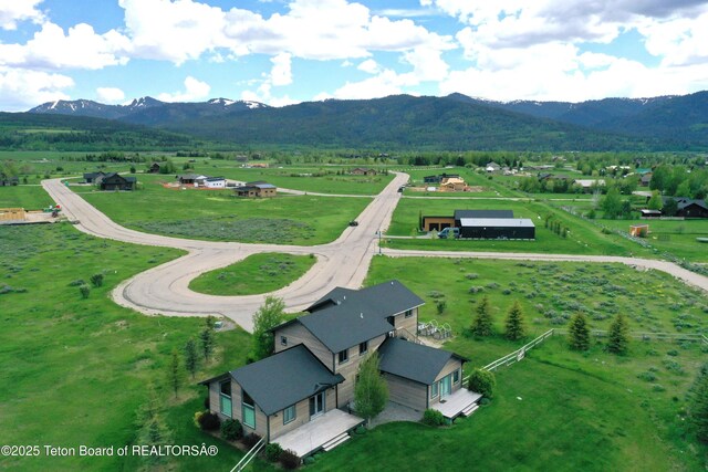 9075 Nesting Eagles Loop, Victor, ID 83455 - aerial view of sparsely populated area featuring a mountain backdrop
