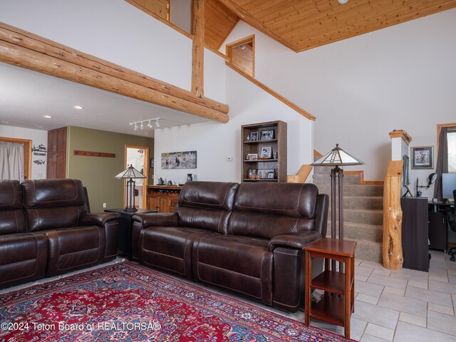 living room with wooden ceiling, vaulted ceiling, recessed lighting, and stairs