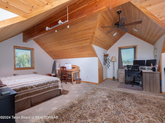bedroom featuring wood ceiling, lofted ceiling with beams, baseboards, and carpet