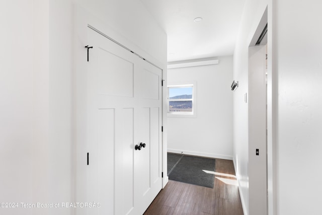 604 Falcon Dr, Alpine, WY 83128 - corridor featuring dark wood-type flooring and baseboards