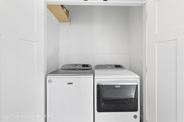 604 Falcon Dr, Alpine, WY 83128 - washroom with washing machine and clothes dryer