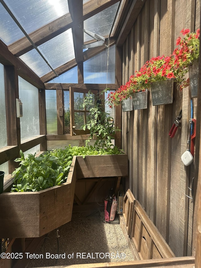 37 Rammell Rd, Victor, ID 83455 - sunroom with vaulted ceiling and wood walls