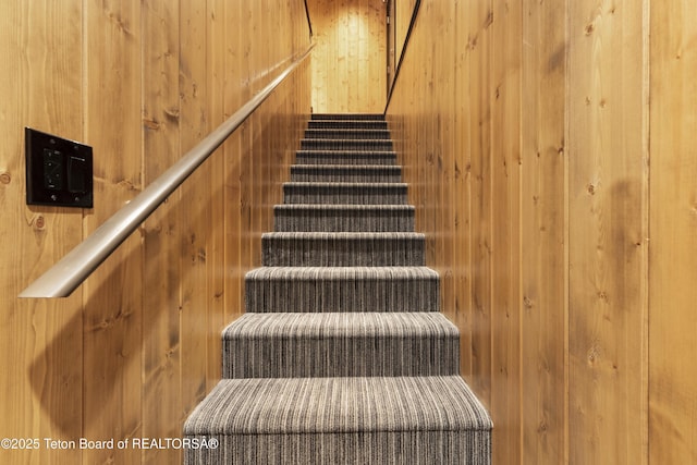 332 N Forest Dr, Star Valley Ranch, WY 83127 - staircase featuring wooden walls