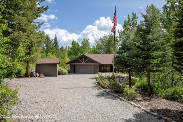 332 N Forest Dr, Star Valley Ranch, WY 83127 - view of front of home with driveway and an attached garage