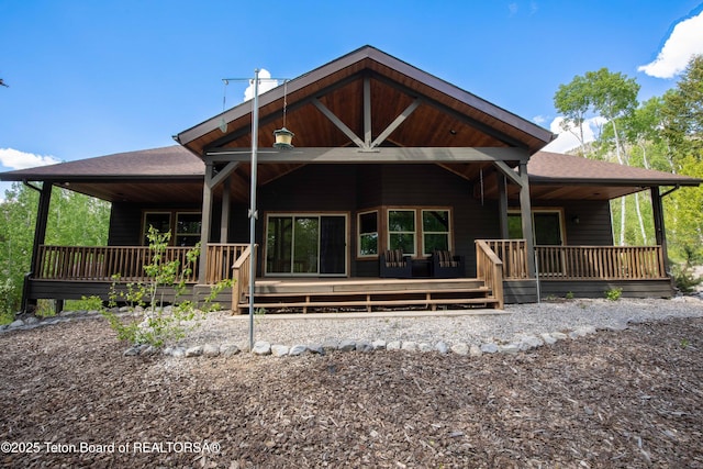 332 N Forest Dr, Star Valley Ranch, WY 83127 - rear view of house featuring roof with shingles