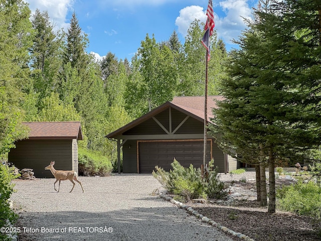 332 N Forest Dr, Star Valley Ranch, WY 83127 - garage with gravel driveway