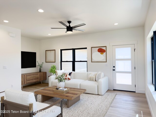 668 Palisade Trl, Driggs, ID 83422 - living area with healthy amount of natural light, ceiling fan, light wood finished floors, and recessed lighting