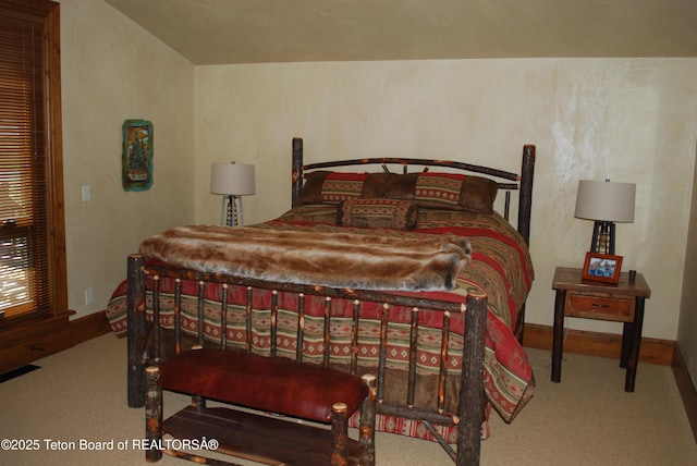 4053 S Adams Rd, Driggs, ID 83422 - carpeted bedroom featuring baseboards