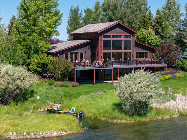 4053 S Adams Rd, Driggs, ID 83422 - back of property featuring a deck with water view