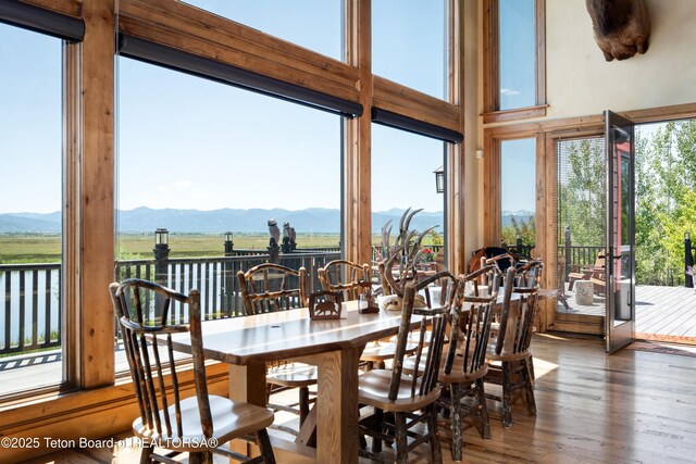 4053 S Adams Rd, Driggs, ID 83422 - dining space featuring a mountain view and wood finished floors