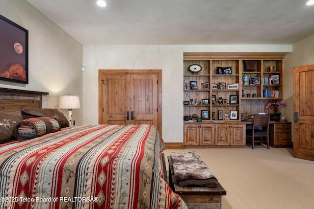 4053 S Adams Rd, Driggs, ID 83422 - carpeted bedroom with recessed lighting and built in desk