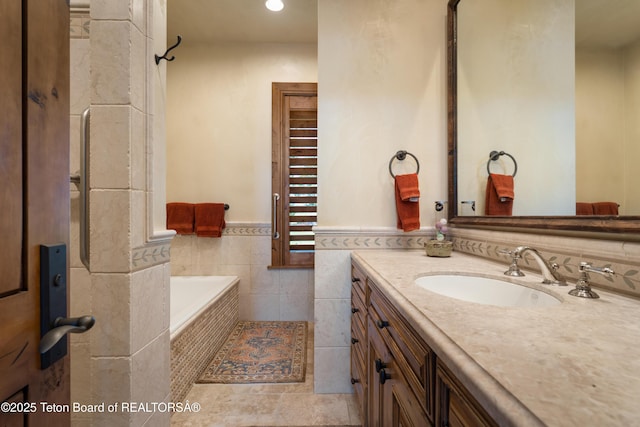 4053 S Adams Rd, Driggs, ID 83422 - full bath featuring a relaxing tiled tub, vanity, and recessed lighting