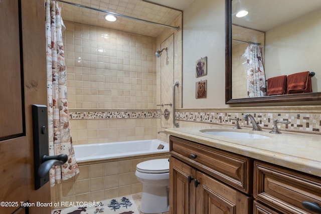 4053 S Adams Rd, Driggs, ID 83422 - bathroom featuring tiled shower / bath combo, vanity, tile patterned flooring, and recessed lighting