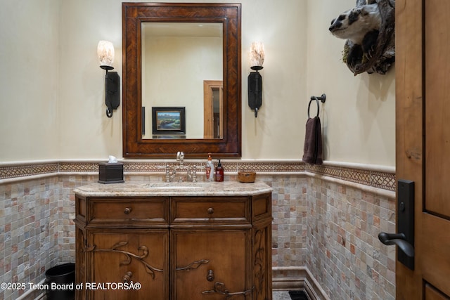4053 S Adams Rd, Driggs, ID 83422 - bathroom featuring vanity and a wainscoted wall