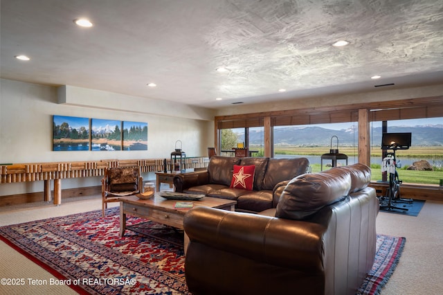 4053 S Adams Rd, Driggs, ID 83422 - carpeted living room featuring recessed lighting and baseboards