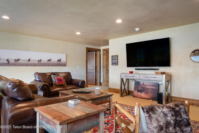 4053 S Adams Rd, Driggs, ID 83422 - living room featuring baseboards and recessed lighting