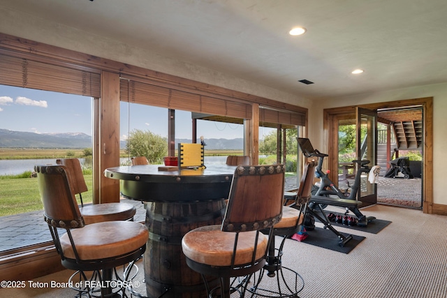 4053 S Adams Rd, Driggs, ID 83422 - dining room with a water view, plenty of natural light, recessed lighting, and carpet