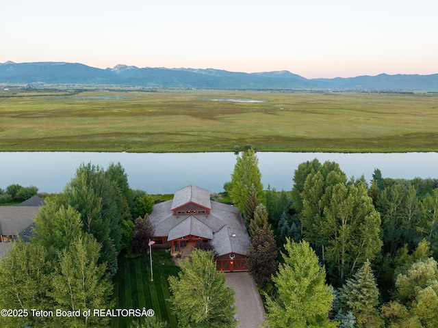 4053 S Adams Rd, Driggs, ID 83422 - aerial view at dusk of a water and mountain view