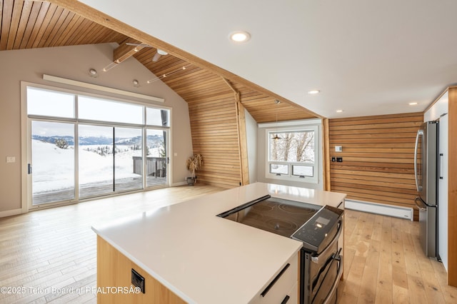 1710 E Porcupine Rd, Jackson, WY 83001 - kitchen with electric stove, freestanding refrigerator, wood ceiling, light wood-style floors, and baseboard heating