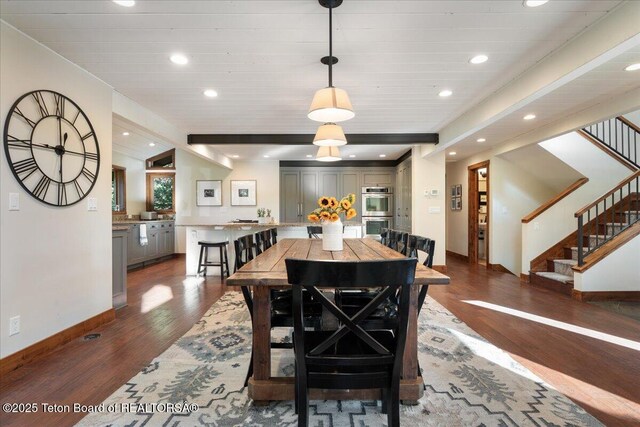 3375 W Killdeer Rd, Jackson, WY 83001 - dining space with baseboards, wood finished floors, recessed lighting, stairs, and lofted ceiling