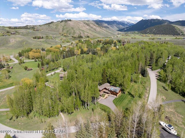 3375 W Killdeer Rd, Jackson, WY 83001 - aerial view of property and surrounding area with a mountainous background