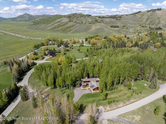 3375 W Killdeer Rd, Jackson, WY 83001 - aerial view of property and surrounding area featuring a mountainous background