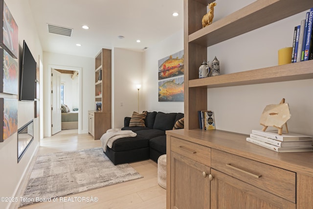 1070 Horseshoe Ln, Driggs, ID 83422 - living room featuring light wood finished floors and recessed lighting