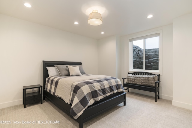 1070 Horseshoe Ln, Driggs, ID 83422 - bedroom with light carpet, recessed lighting, and baseboards