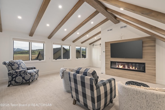 1070 Horseshoe Ln, Driggs, ID 83422 - cinema room with recessed lighting, carpet, a glass covered fireplace, baseboards, and plenty of natural light
