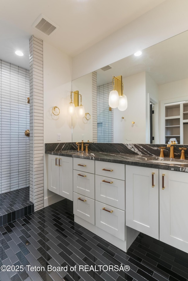 1070 Horseshoe Ln, Driggs, ID 83422 - full bathroom with double vanity and recessed lighting