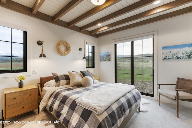 1070 Horseshoe Ln, Driggs, ID 83422 - bedroom with light carpet, access to exterior, beamed ceiling, and wood ceiling