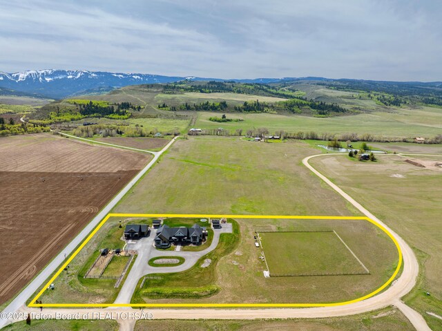 1070 Horseshoe Ln, Driggs, ID 83422 - aerial view of sparsely populated area featuring property parcel outlined and mountains