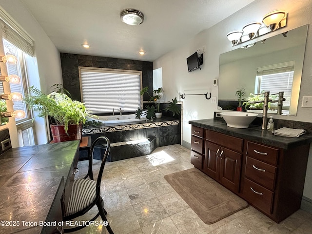 125 Wagon Rut Ln, Auburn, WY 83111 - bathroom featuring vanity and a bath