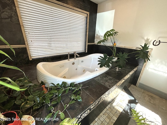125 Wagon Rut Ln, Auburn, WY 83111 - full bathroom with a tub with jets