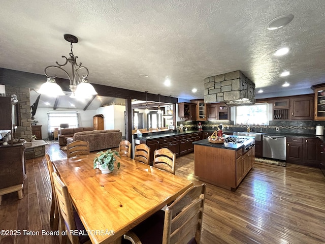 125 Wagon Rut Ln, Auburn, WY 83111 - dining room with a textured ceiling, dark wood-style floors, recessed lighting, and a chandelier