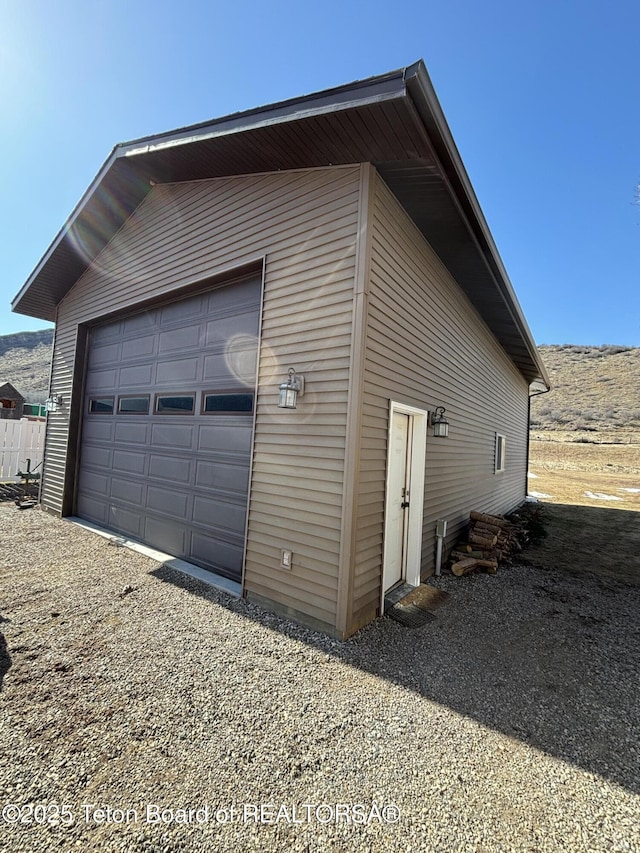 125 Wagon Rut Ln, Auburn, WY 83111 - detached garage featuring gravel driveway