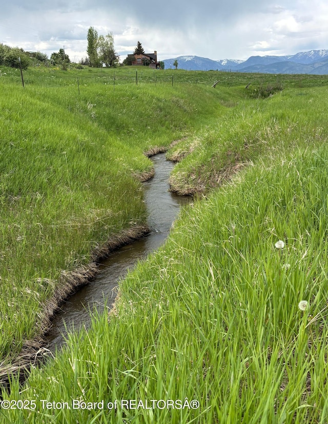 125 Wagon Rut Ln, Auburn, WY 83111 - view of yard featuring a mountain view