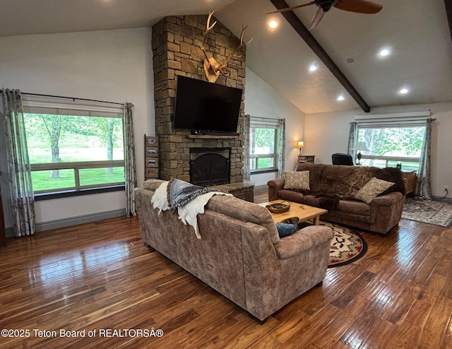 125 Wagon Rut Ln, Auburn, WY 83111 - living room with hardwood / wood-style flooring, healthy amount of natural light, ceiling fan, a fireplace, and high vaulted ceiling