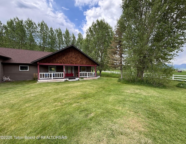 125 Wagon Rut Ln, Auburn, WY 83111 - rear view of property featuring a porch and roof with shingles