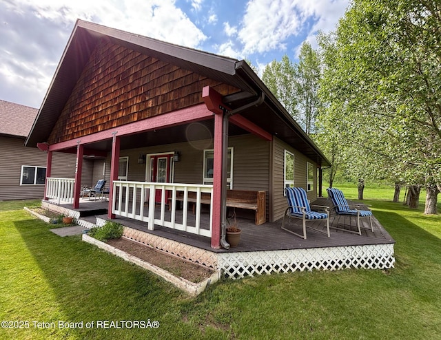 125 Wagon Rut Ln, Auburn, WY 83111 - rear view of property with a yard