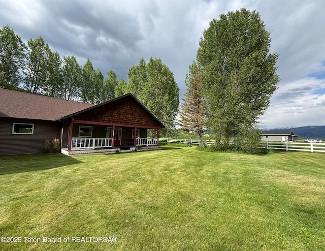 125 Wagon Rut Ln, Auburn, WY 83111 - view of yard featuring a porch