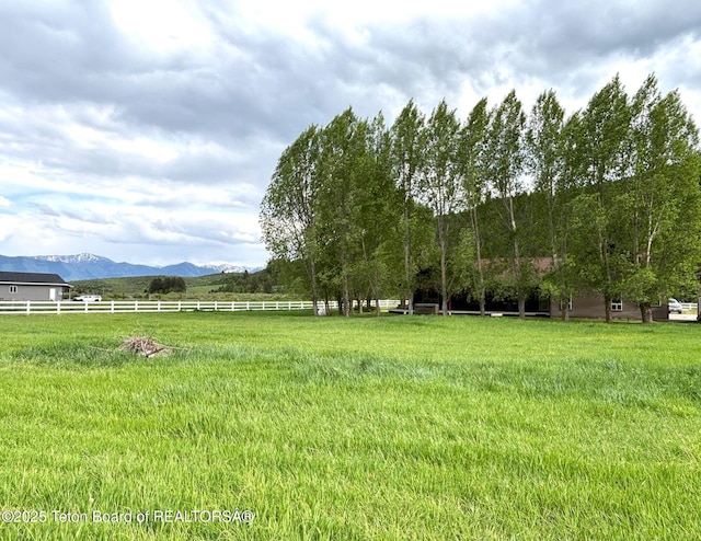 125 Wagon Rut Ln, Auburn, WY 83111 - view of yard featuring a mountain view