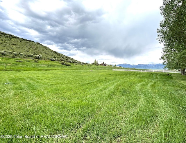 125 Wagon Rut Ln, Auburn, WY 83111 - view of yard with a rural view and a mountain view