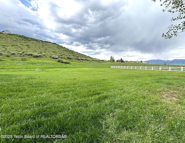 125 Wagon Rut Ln, Auburn, WY 83111 - view of yard featuring a view of countryside and a mountain view