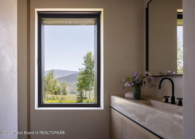 2205 W Pemmican Rd, Jackson, WY 83001 - bathroom featuring vanity and a mountain view